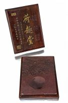 A Chinese duan inkstone and hardwood case, Qing Dynasty, 19th century