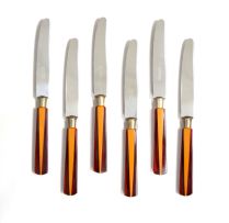 A set of six bakelite fruit knives