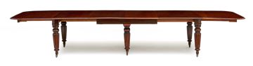 A late Regency mahogany extending dining table