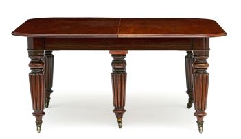 A late Regency mahogany extending dining table