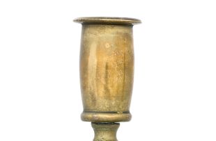 A pair of brass candlesticks, 20th century