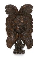 A pair of Italian carved fruitwood cherubs, 18th century