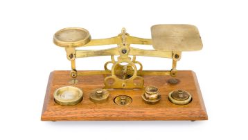 A set of brass postal scales, first half 20th century