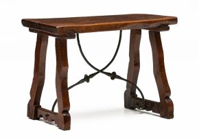 A Southern European walnut and fruitwood trestle table, 17th/18th century