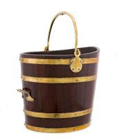 A George III brass-bound mahogany peat bucket, 19th century