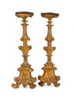 A pair of Italian giltwood candlesticks, 19th century