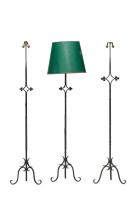 Three wrought iron standing lamps