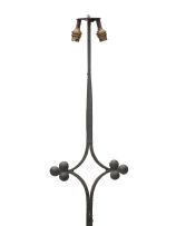 Three wrought iron standing lamps