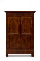 A Biedermeier mahogany cupboard, 19th century