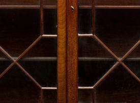 A George III style mahogany bookcase bureau, modern