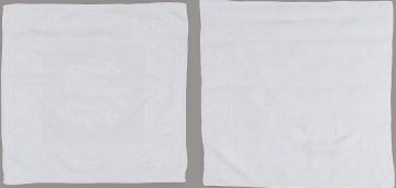 A set of eight damask linen table napkins