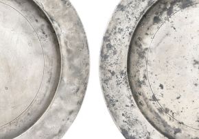 A pair of pewter chargers, maker's initials TB, 18th century