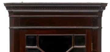 A George III style mahogany corner cupboard