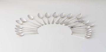 A miscellaneous group of twenty-one silver tea and coffee spoons, various makers, London, Birmingham and Sheffield, 1880-1973