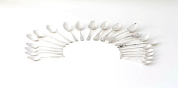 A miscellaneous group of twenty-one silver tea and coffee spoons, various makers, London, Birmingham and Sheffield, 1880-1973