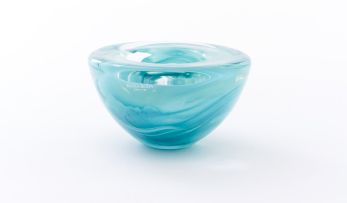 A Kosta Boda green and clear glass bowl, modern