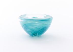 A Kosta Boda green and clear glass bowl, modern