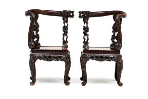 A pair of Chinese hardwood corner chairs, late 19th/early 20th century