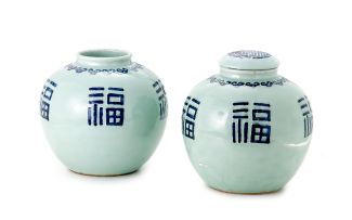 A pair of Chinese celadon-glazed jars, Qing Dynasty, 19th century