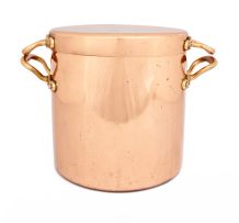 A copper stock pot and cover