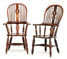 A near pair of Victorian yew, ash and elm Windsor armchairs