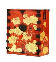 A Japanese red lacquer and gilt-painted cabinet, late Meiji period, 19th century