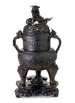 A Chinese bronze tripod censer and cover, late 18th/early 19th century