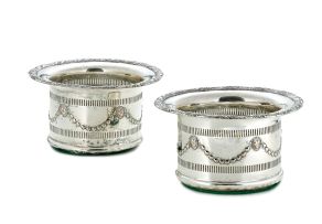A pair of silver-plate wine coasters, late 19th century