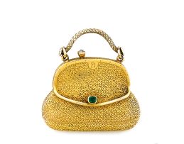 A 22ct gold 'handbag' vinaigrette, 19th century