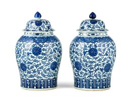 An impressive pair of Chinese blue and white jars and covers, Qing Dynasty, 18th century