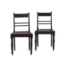 A pair of Cape stinkwood and caned side chairs, mid 19th century