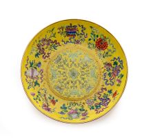 A Chinese yellow-ground famille-rose saucer dish, Qing Dynasty, Tongzhi (1862-1874)