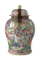 A Chinese Canton famille-rose brass-mounted baluster temple jar, Qing Dynasty, 19th century
