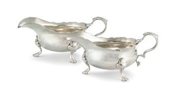 A pair of George II silver sauce boats, maker's marks worn, London, 1740