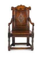 An oak and inlaid armchair, part 18th century