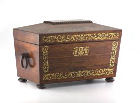 A Regency rosewood and brass-inlaid tea caddy, first quarter 19th century