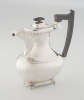 A Queen Elizabeth II silver hot water jug, Viner's Ltd, Sheffield, 1957
