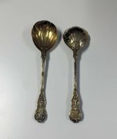 A pair of Victorian silver-gilt Chased Vine pattern serving spoons, Holland, Aldwinckle & Slater, London, 1895