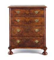 A George II style walnut and walnut-veneered chest of drawers