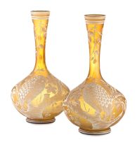 A pair of enamelled amber-coloured glass vases, late 19th century