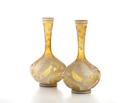 A pair of enamelled amber-coloured glass vases, late 19th century