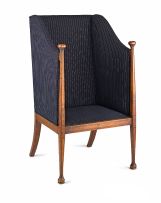 An Arts and Crafts mahogany and satinbirch inlaid upholstered armchair