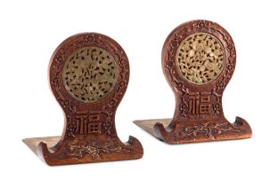 A pair of Chinese hardwood, jade and brass bookends, early 20th century