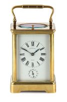 A gilt-brass repeating carriage clock with alarm, circa 1890