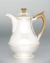 A George III silver hot water jug, maker's marks worn, London, 1819
