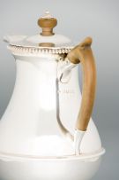 A George III silver hot water jug, maker's marks worn, London, 1819