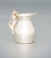 A silver cream jug, maker's initials NP, London, 1999