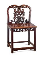 A Chinese carved huanghuali rose chair, Qing Dynasty, early 19th century