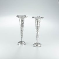 A pair of Chinese Export silver spill vases, late 19th/early 20th century