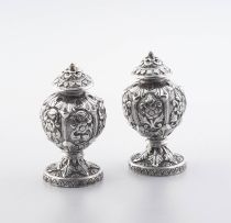 A pair of Indian Colonial silver pepper pots, 19th century